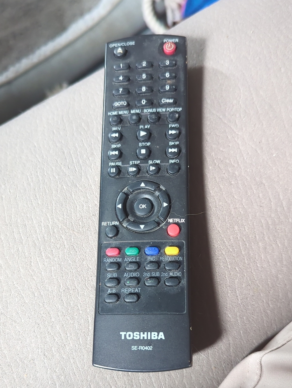 Toshiba Black Remote with Red, Green, Yellow and Blue Buttons